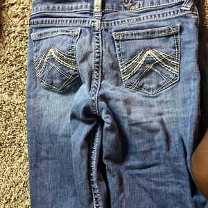 The brand is Ariat Real Denim